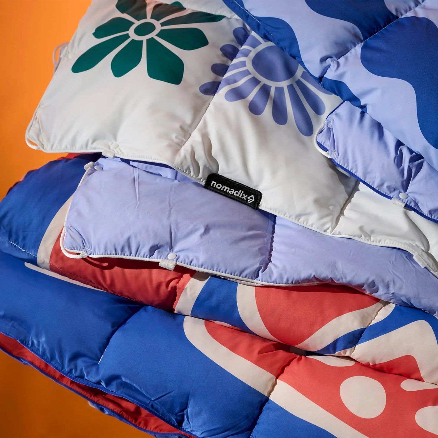 Graphene Puffer Blanket: Flowerbed Multi Nomadix